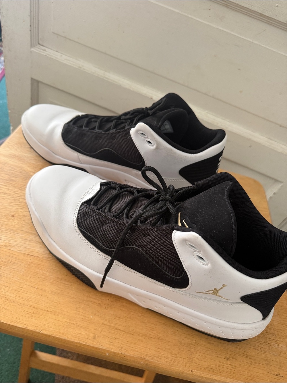 Nike Men’s Black and White Low-Top Sneakers with Gold Jumpman